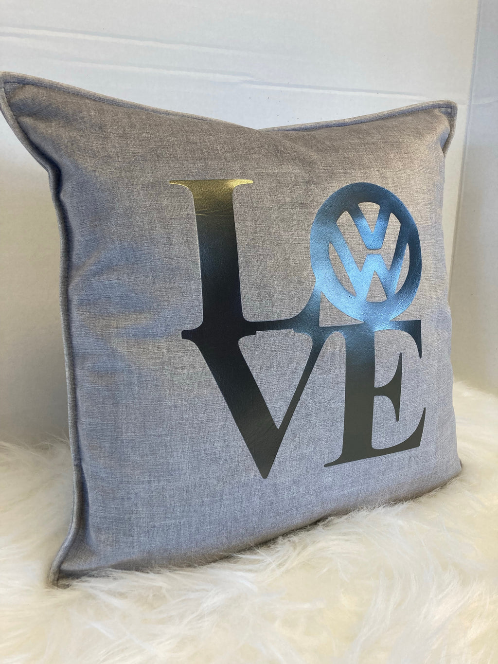 Gray pillow with 'LOVE' Logo
