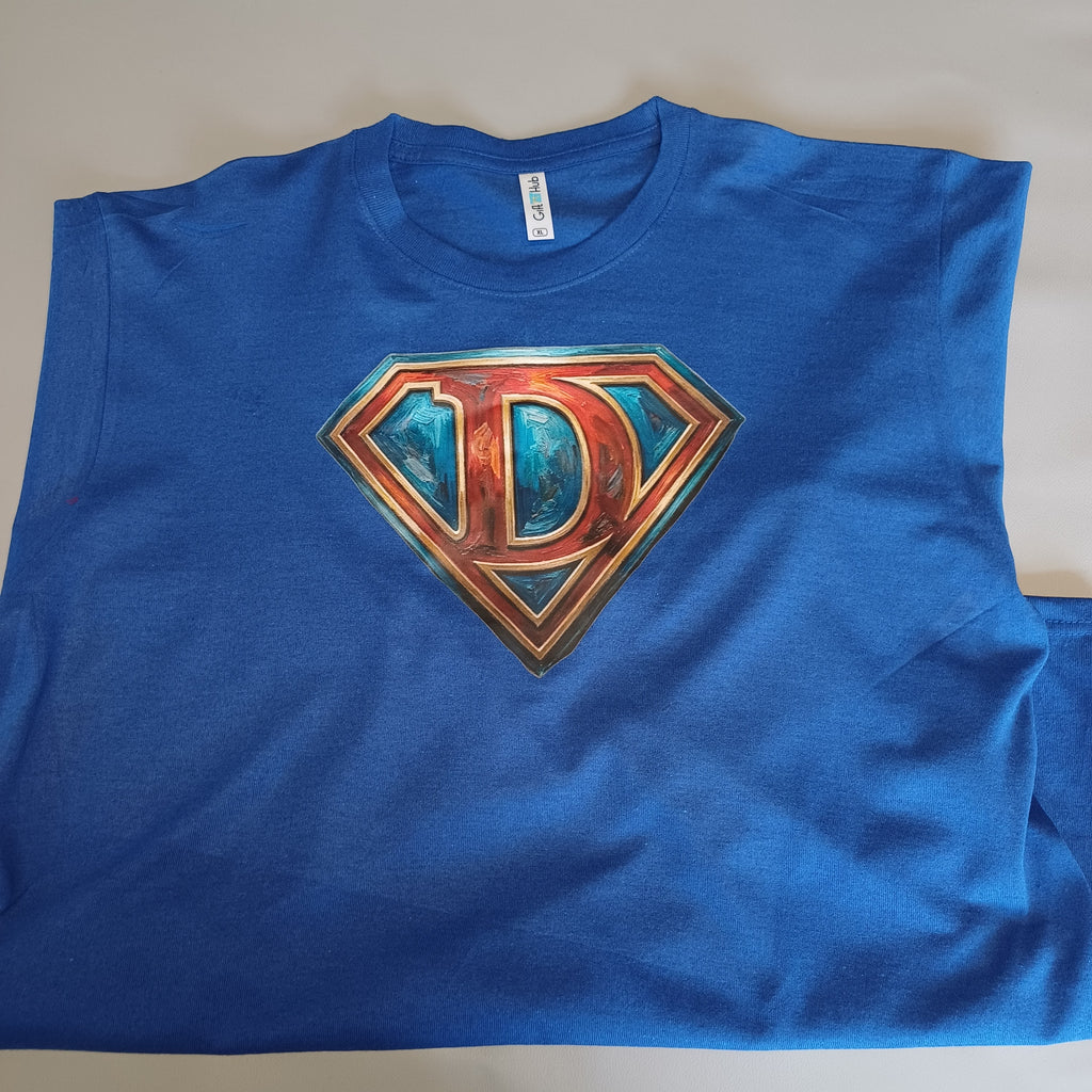Blue t-shirt with a metallic 'D' logo on a plain background