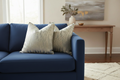 Harlequin Cushions on Blue Sofa